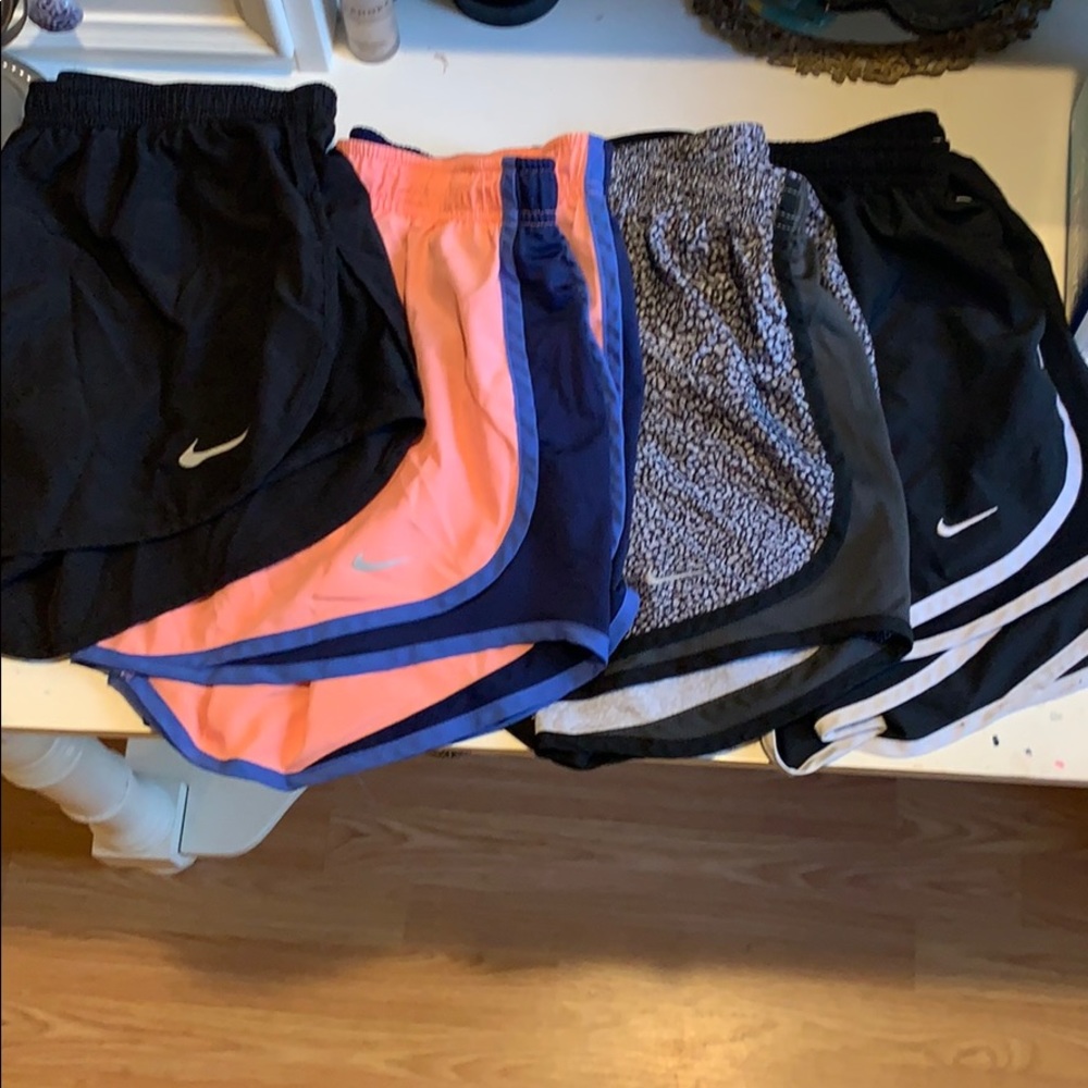 4 pairs of Nike Dri- Fit Women’s Shorts
